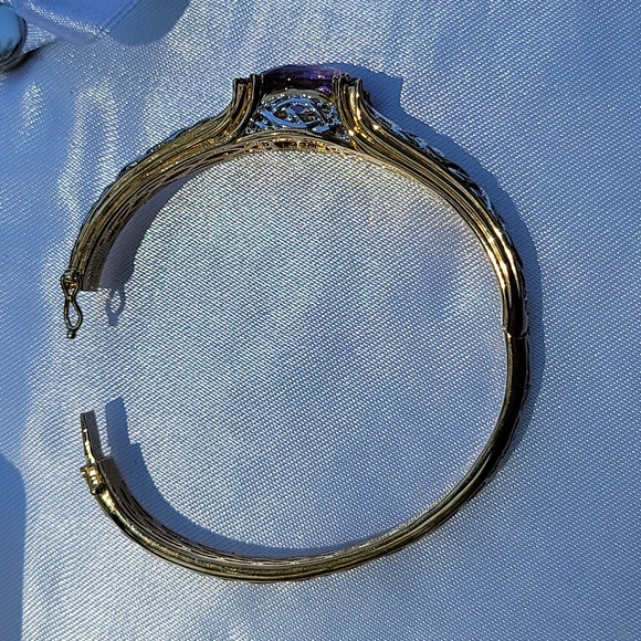 Bangle bracelet with security clasp 925 mark with goldtone. Multi-gemsto…